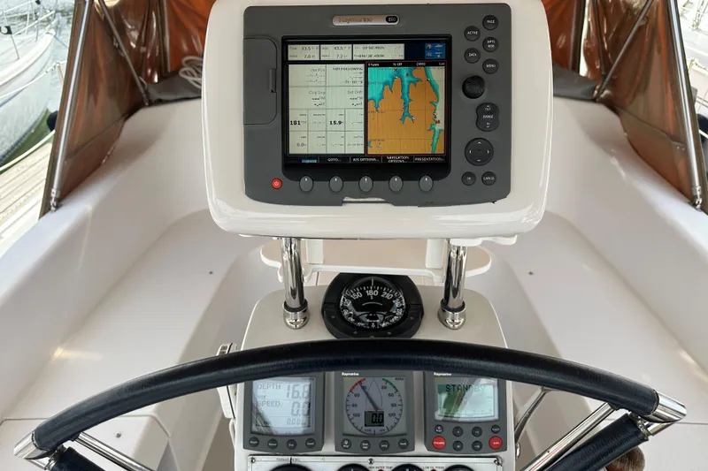 Slide: The Image of Cockpit of 2006 Catalina 387 sailboat with navigation equipment and compass. - 6