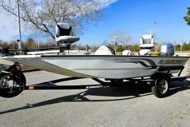 Slide: The Image of 2014 Alumacraft Pro 165 boat on trailer, parked outdoors. - 5