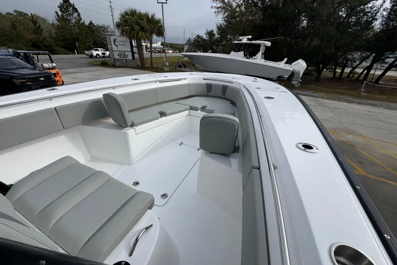 Slide: The Image of 2026 Cape Horn 32 XS boat interior with sleek seating and modern design. - 17