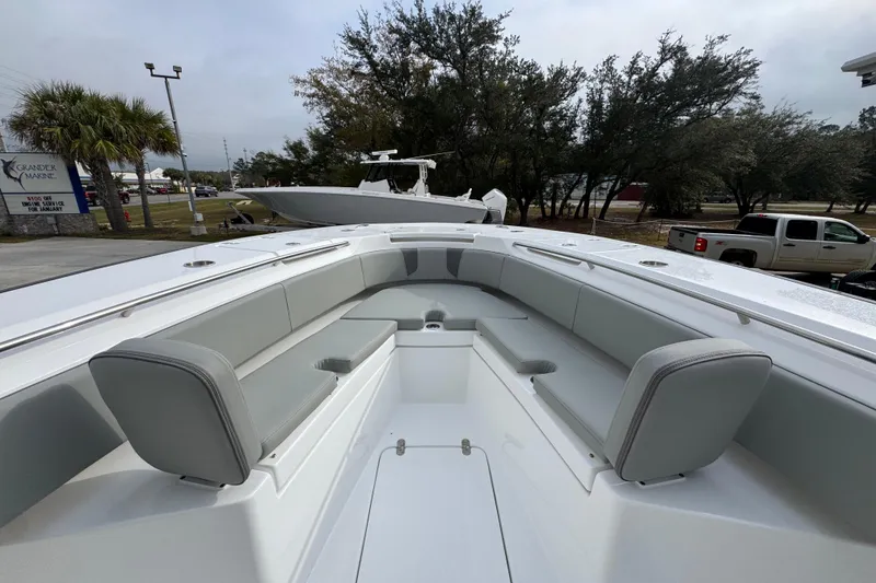 Slide: The Image of 2026 Cape Horn 32 XS boat interior with spacious seating and sleek design. - 18