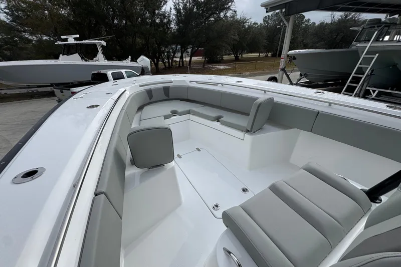 Slide: The Image of 2026 Cape Horn 32 XS boat interior with sleek seating and modern design. - 19