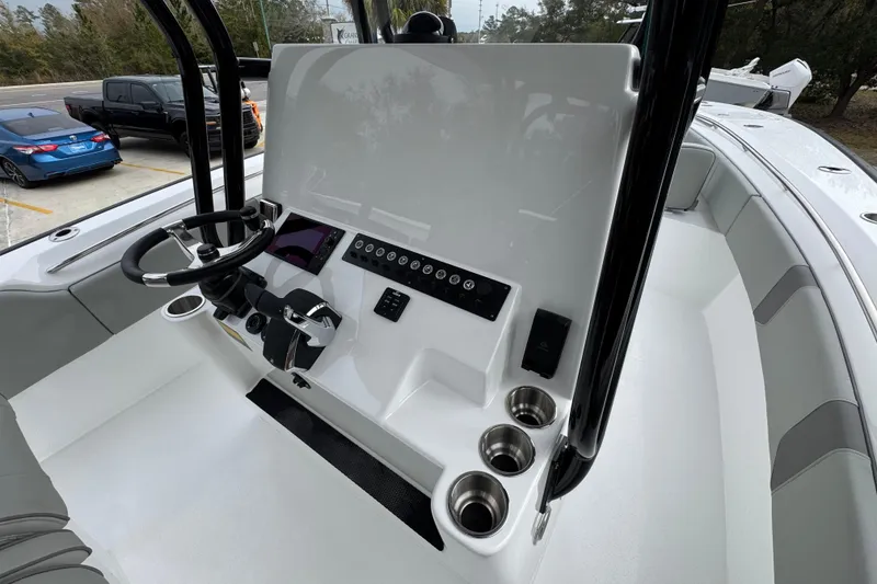 Slide: The Image of 2026 Cape Horn 32 XS boat cockpit with steering wheel and control panel. - 29