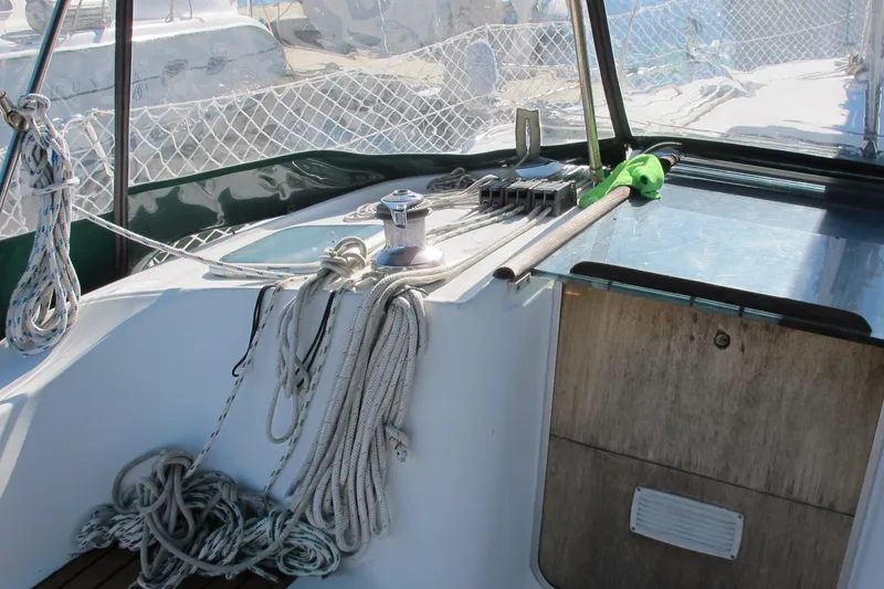 Slide: The Image of Cockpit of 2000 Beneteau Oceanis 361 sailboat with ropes and winch. - 13