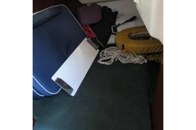 Slide: The Image of Interior of 2000 Beneteau Oceanis 361 sailboat with ropes and life preserver. - 18