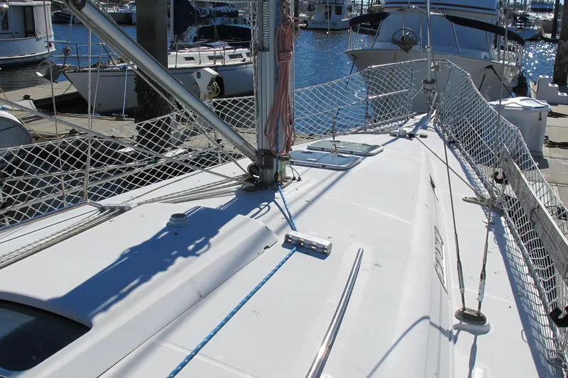 Slide: The Image of Beneteau Oceanis 361 sailboat deck, 2000 model, docked in a marina. - 8