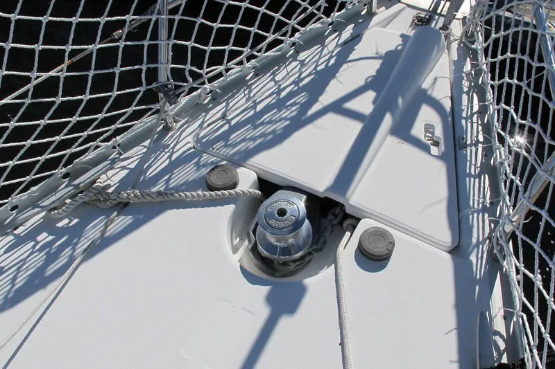 Slide: The Image of Deck of 2000 Beneteau Oceanis 361 sailboat with winch and safety netting. - 9