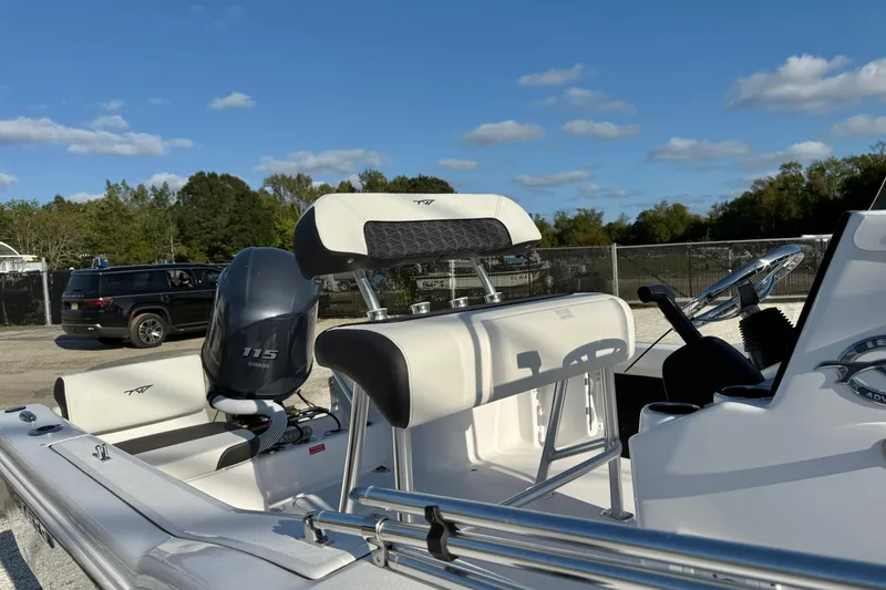 Slide: The Image of 2026 Tidewater 180 CC Adventure boat with Yamaha engine, featuring sleek interior and modern controls. - 8