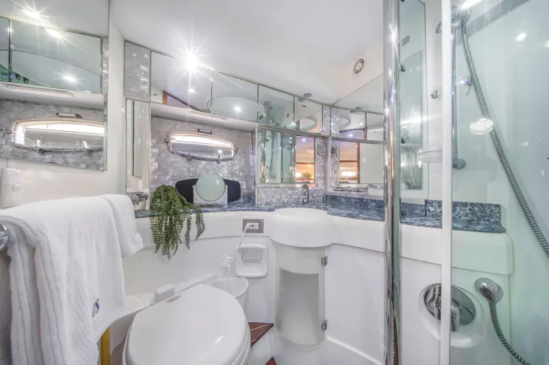 Slide: The Image of Luxurious 2009 Fairline Targa 52 yacht bathroom with modern fixtures and elegant design. - 16