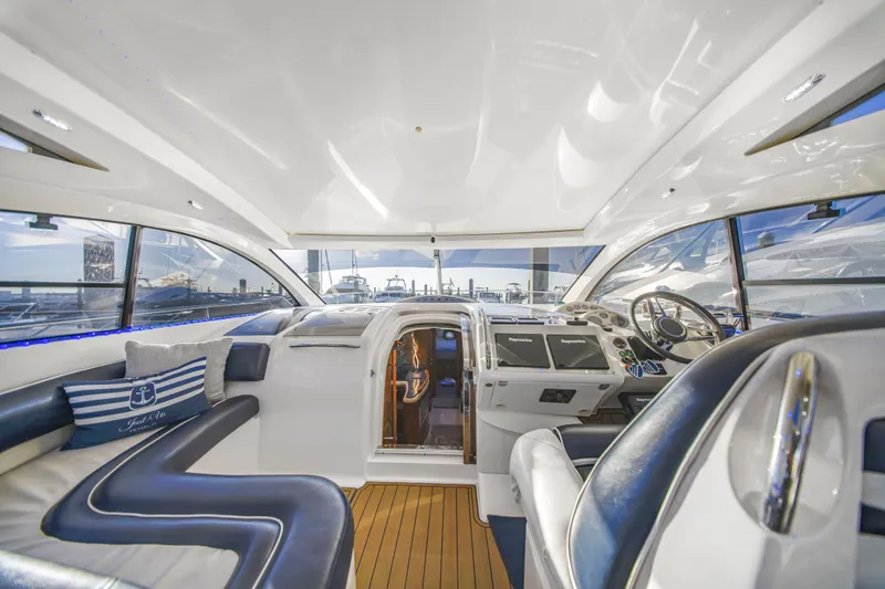 Slide: The Image of Luxurious interior of 2009 Fairline Targa 52 yacht with modern helm and seating. - 18