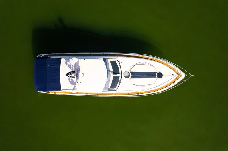 Slide: The Image of Overhead view of 2009 Fairline Targa 52 yacht on green water. - 19