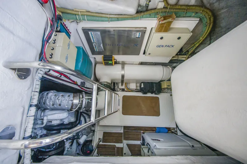 Slide: The Image of Engine room of 2009 Fairline Targa 52 yacht, featuring generator and equipment. - 26