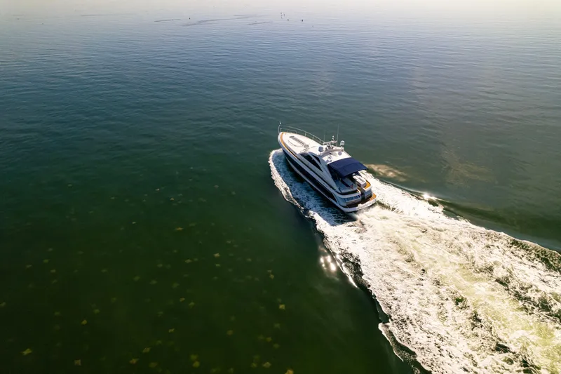 Slide: The Image of 2009 Fairline Targa 52 yacht cruising on calm waters, aerial view. - 41
