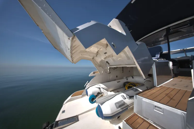 Slide: The Image of 2009 Fairline Targa 52 yacht with open storage compartment, ocean view. - 43