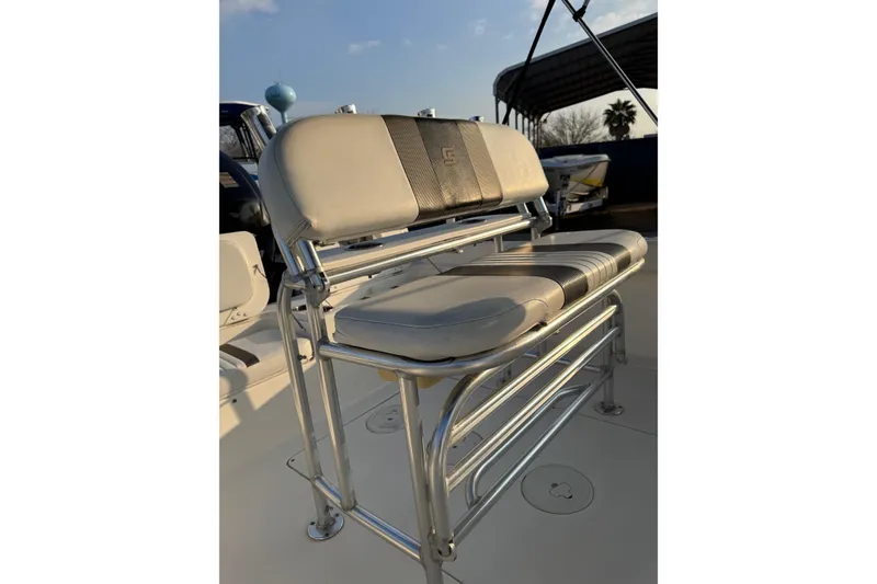 Slide: The Image of 2012 Carolina Skiff 21 Ultra Elite boat seat with stainless steel frame. - 6