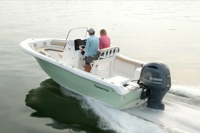 The Image of 2026 Tidewater 198 CC Adventure boat on trailer, parked outside dealership. - 0