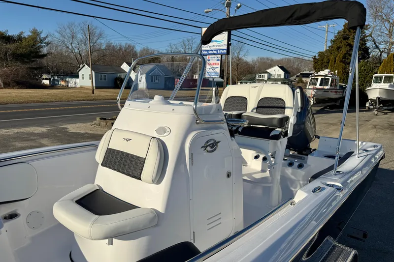 Slide: The Image of 2026 Tidewater 198 CC Adventure boat with sleek design and comfortable seating. - 18