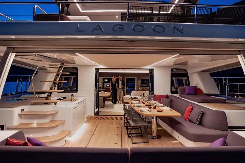 Slide: The Image of Luxurious 2025 Lagoon SIXTY 7 yacht interior with elegant dining area and modern design. - 8