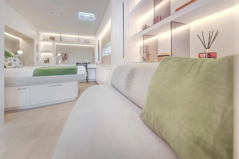 Slide: The Image of Luxurious interior of 2025 Lagoon SIXTY 5 yacht with modern design and ambient lighting. - 25