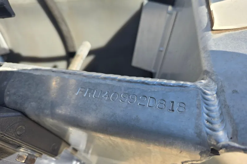 Slide: The Image of Serial number "FRU40992D818" on 2018 South Bay 200 metal component. - 17