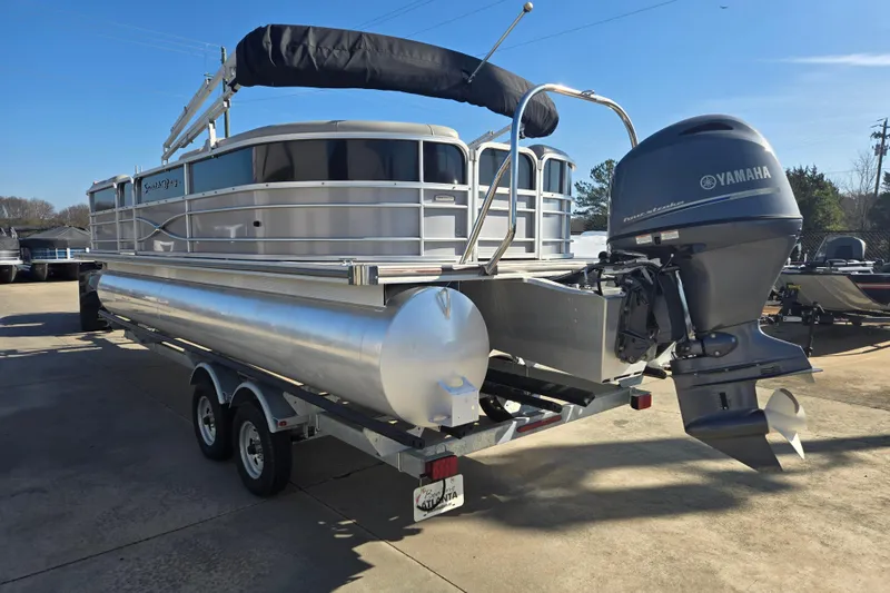 Slide: The Image of 2018 South Bay 200 pontoon boat with Yamaha outboard motor on trailer. - 3