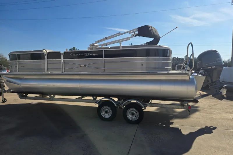 Slide: The Image of 2018 South Bay 200 pontoon boat on trailer, sunny day background. - 7