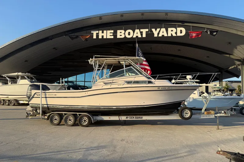 Slide: The Image of 1992 Grady White 300 Marlin boat on trailer at The Boat Yard. - 14