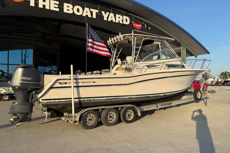 Slide: The Image of 1992 Grady White 300 Marlin boat on trailer at The Boat Yard dealership. - 15