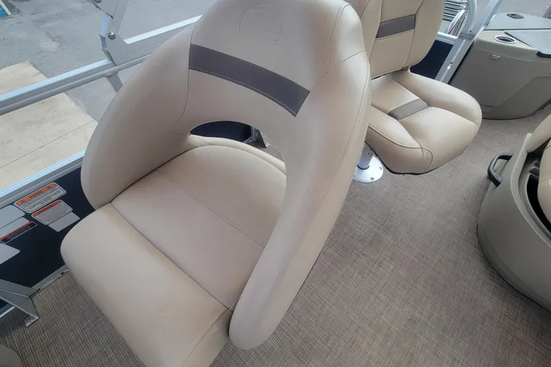 Slide: The Image of 2023 Sun Tracker Bass Buggy 18 DLX boat seats, beige upholstery, comfortable design. - 15