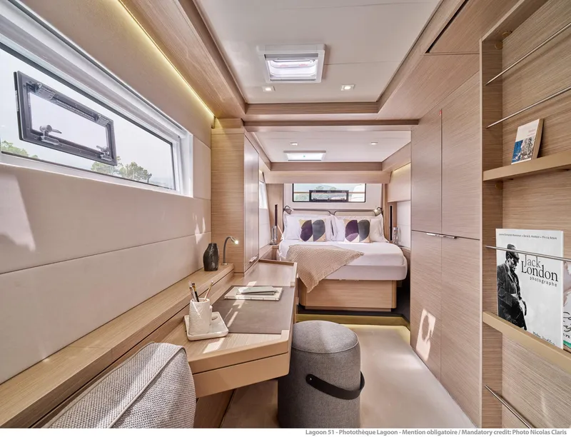 Slide: The Image of Luxurious interior of 2025 Lagoon 51 ICONIC yacht with modern design and cozy bedroom. - 43