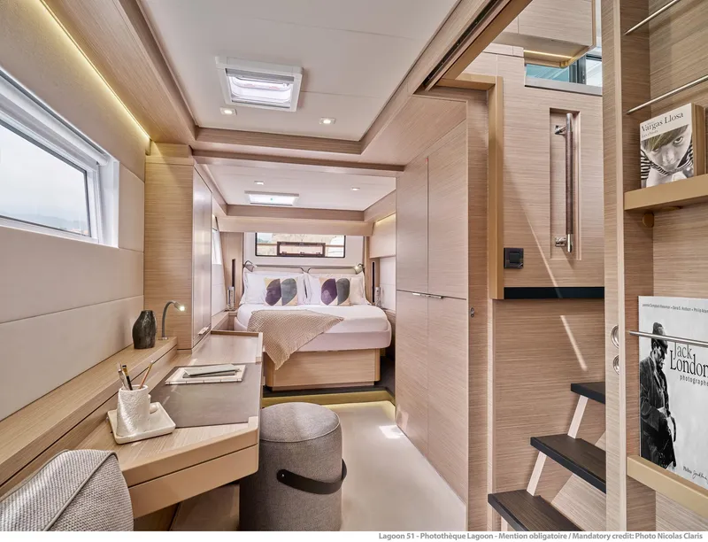 Slide: The Image of Luxurious interior of 2025 Lagoon 51 ICONIC yacht, featuring modern design and cozy bedroom. - 44