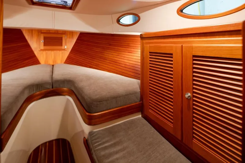 Slide: The Image of Luxurious interior of 2008 San Juan 30 yacht with wooden finish and cozy seating. - 20