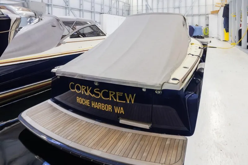 Slide: The Image of Covered 2008 San Juan 30 boat named "Corkscrew" in Roche Harbor, WA. - 4