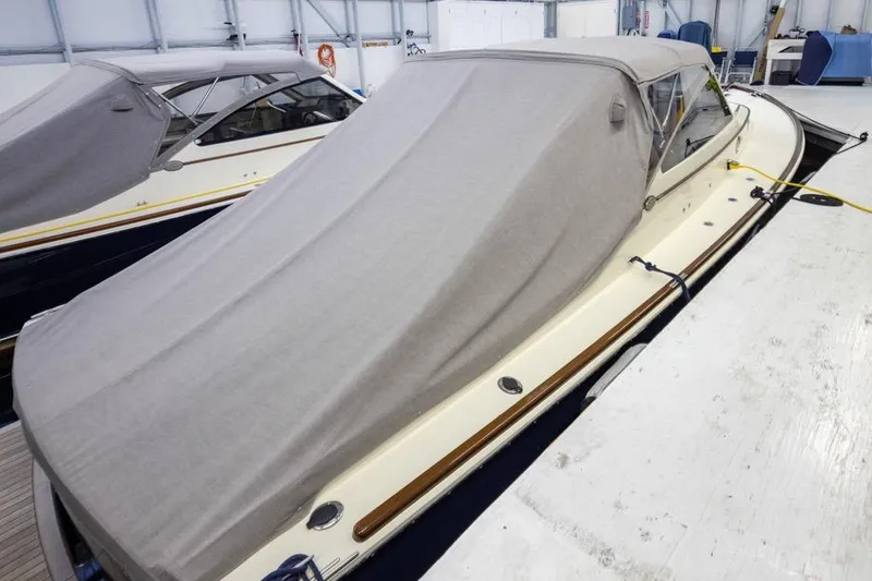 Slide: The Image of Covered 2008 San Juan 30 boat in storage, side view. - 5