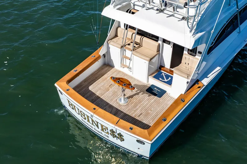 Slide: The Image of Luxury yacht "Post 42" from 2001, featuring spacious deck and seating area. - 66