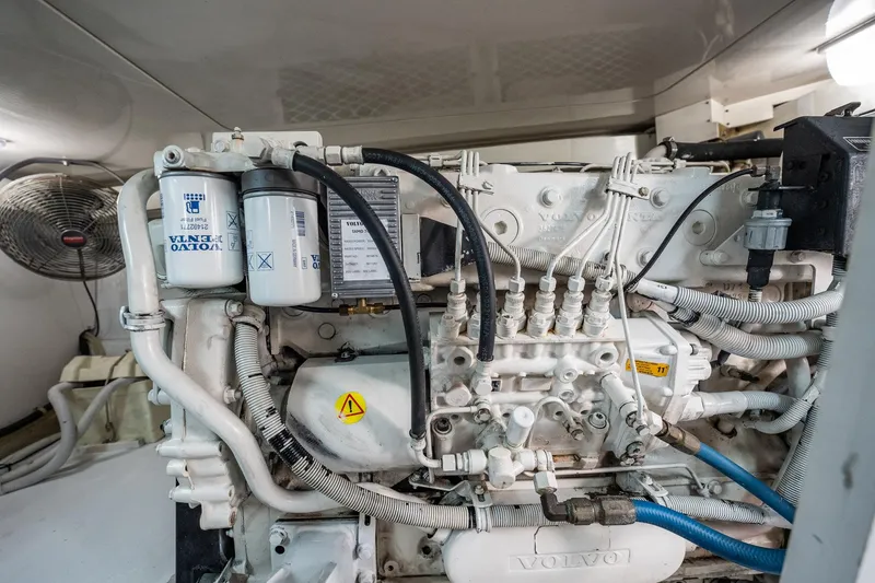 Slide: The Image of Volvo engine in a Post 42 model, 2001, with visible filters and wiring. - 71