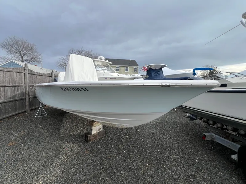 The Image of 2016 Sportsman Masters 227 Bay Boat on gravel lot. - 0