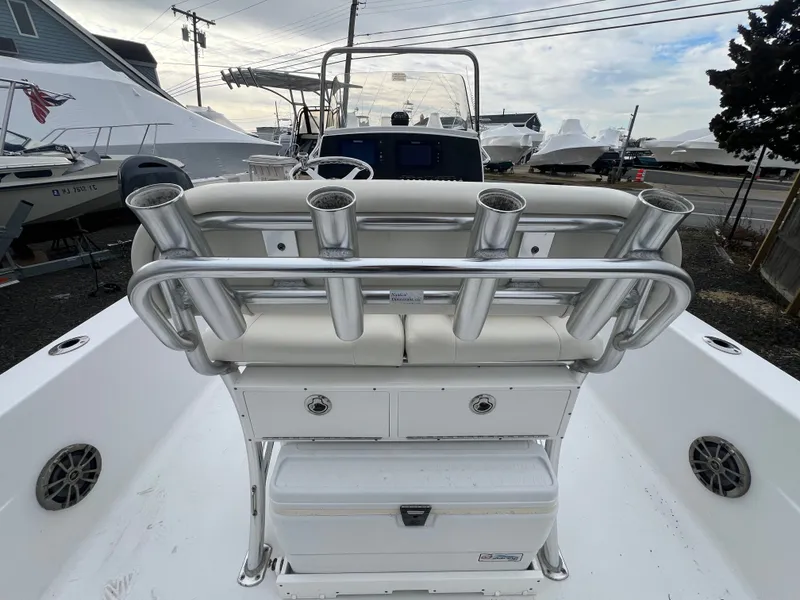 Slide: The Image of 2016 Sportsman Masters 227 Bay Boat with fishing rod holders. - 14