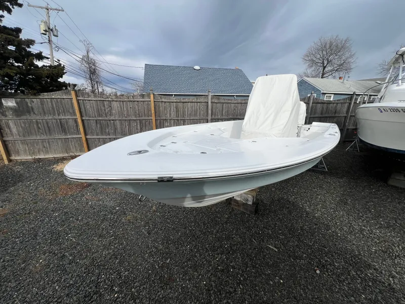 Slide: The Image of 2016 Sportsman Masters 227 Bay Boat on gravel lot. - 5