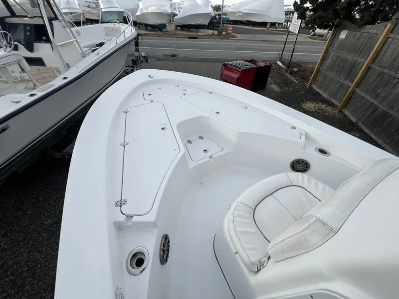 Slide: The Image of 2016 Sportsman Masters 227 Bay Boat in a parking area. - 6