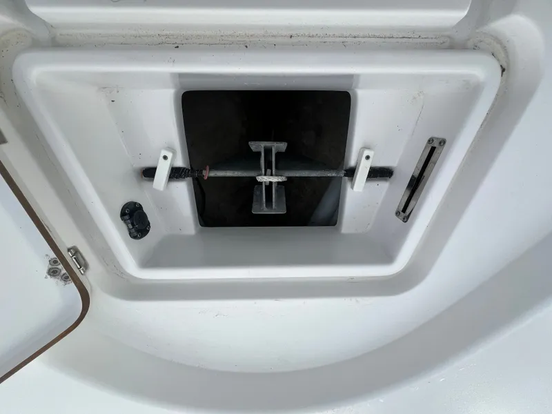 Slide: The Image of Anchor compartment of a 2016 Sportsman Masters 227 Bay Boat. - 9