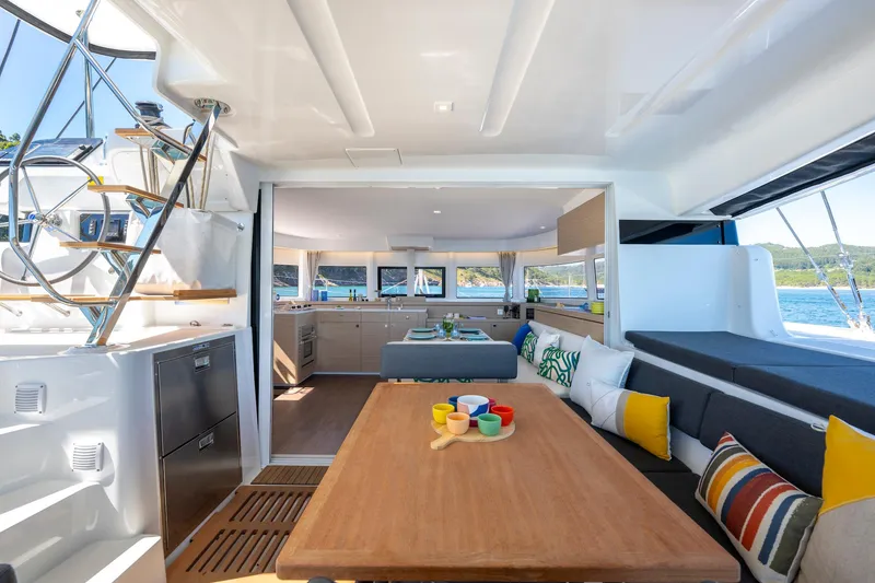 Slide: The Image of Luxurious interior of 2025 Lagoon 43 yacht with modern kitchen and seating area. - 16