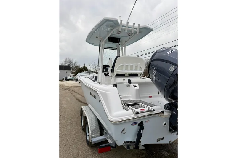 Slide: The Image of 2026 Tidewater 210 CC Adventure boat with Yamaha 150 engine on trailer. - 13