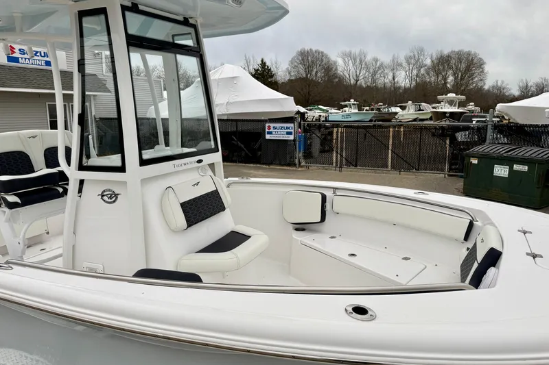 Slide: The Image of 2026 Tidewater 210 CC Adventure boat with spacious seating and modern design. - 26