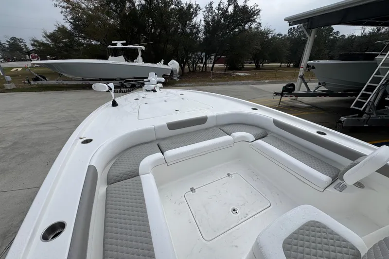 Slide: The Image of 2026 Caymas 281 HB boat with spacious seating and modern design. - 20