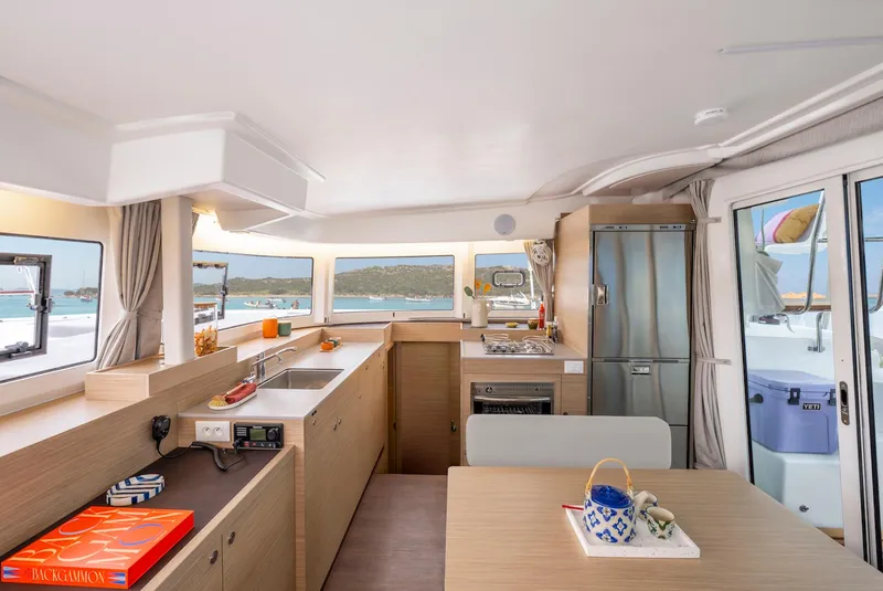 Slide: The Image of Modern kitchen interior of 2025 Lagoon 38 catamaran with ocean view. - 37