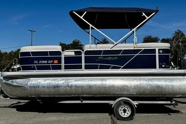 The Image of 2018 Godfrey Sweetwater 2086 C pontoon boat with canopy on trailer. - 0