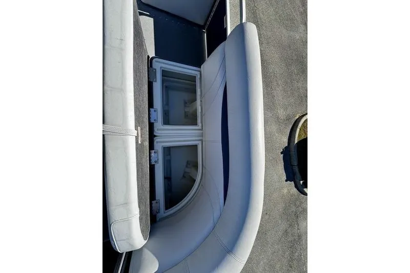 Slide: The Image of 2018 Godfrey Sweetwater 2086 C boat seating with storage compartments. - 17