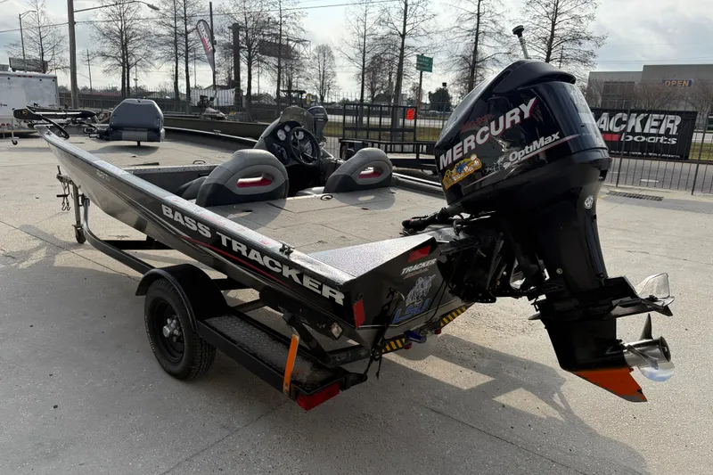 Slide: The Image of 2011 Bass Tracker PRO TEAM 190 TX boat with Mercury OptiMax engine on trailer. - 4