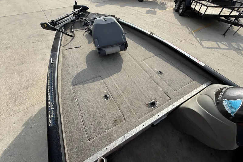 Slide: The Image of 2011 Bass Tracker PRO TEAM 190 TX boat deck with seating and storage compartments. - 8