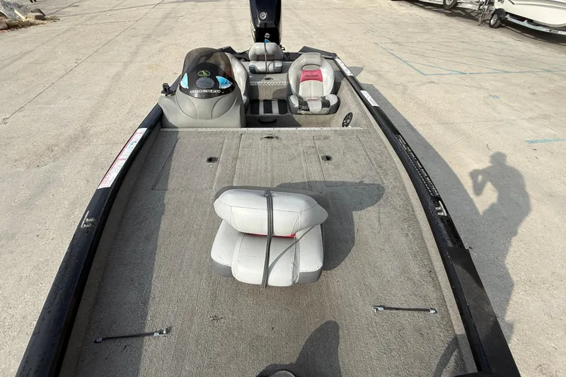 Slide: The Image of 2011 Bass Tracker PRO TEAM 190 TX boat interior with seating and console. - 9